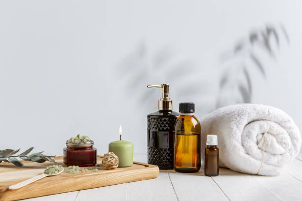 istock Beautiful spa composition on massage table in wellness center, copyspace, leaves' shadow 1264315136