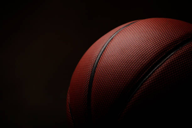 istock image of basketball dark background 1264316391