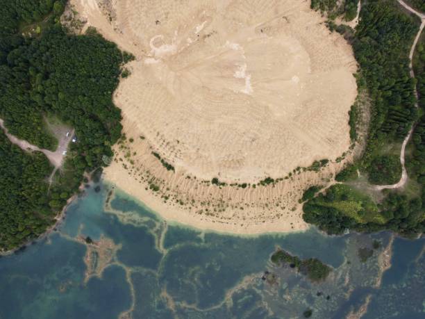 istock Old flooded sand pit aerial photo 1264317845