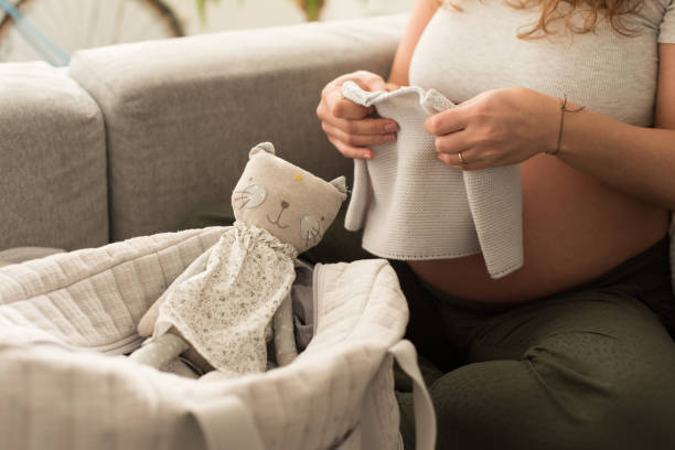 istock Pregnant woman packing maternity bag 1264319214