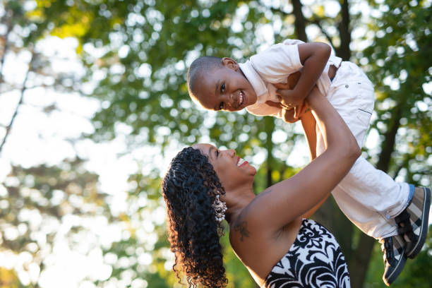 istock Mother and son bonding in the park 1264320824