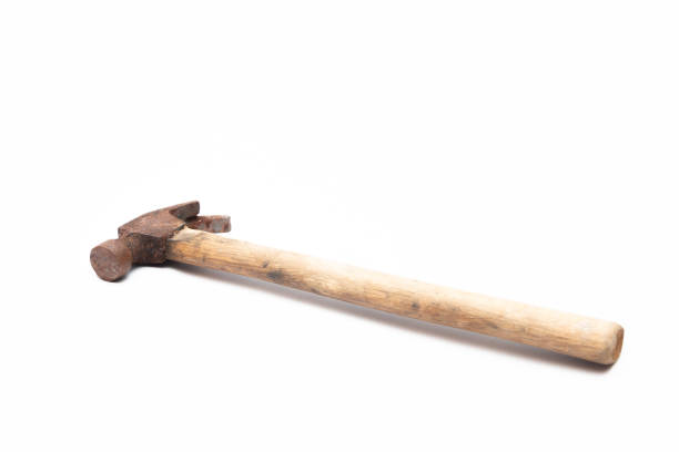 istock old rusty and dirty hammer isolated on white background. 1264322174