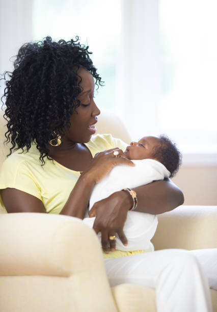 istock Mother and newborn baby together 1264324452