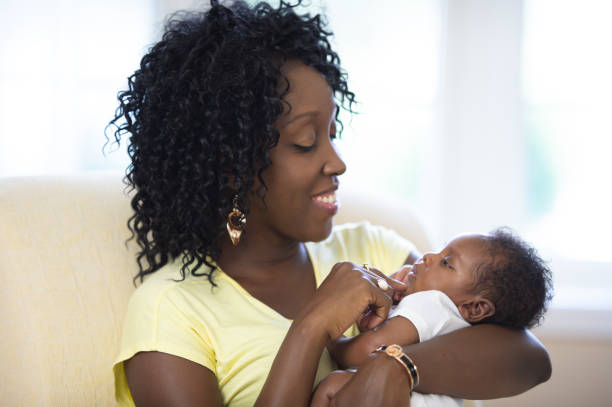 istock Mother and newborn baby together 1264324454