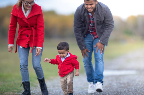 istock Family going for a post-rain walk in the fall 1264327191
