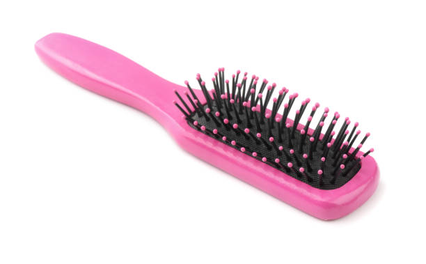 istock Pink wood hairbrush isolated 1264328529
