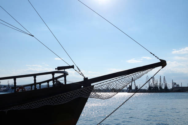 istock the bow of an old ship against a blue sunset sky 1264329596