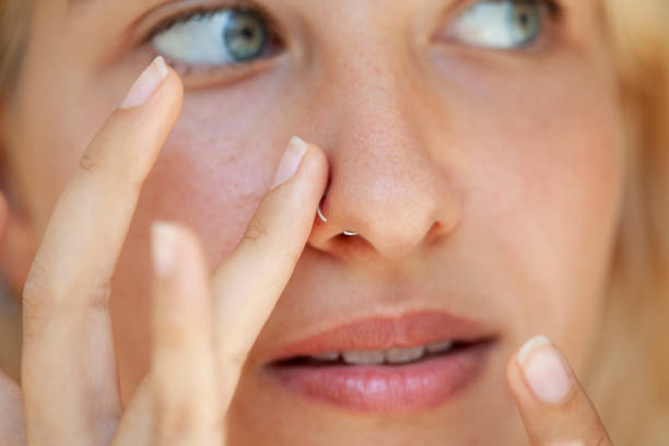 istock blue eyed girl wearing a nose piercing 1264330151
