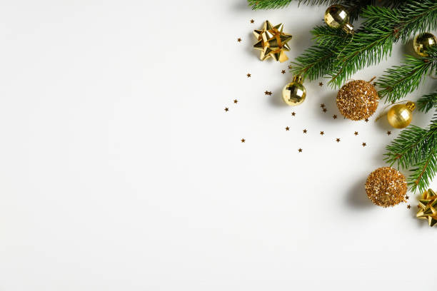 istock Flat lay Christmas composition. Christmas tree and golden balls on white background. Xmas greeting card mockup, New Year banner template. 1264332163