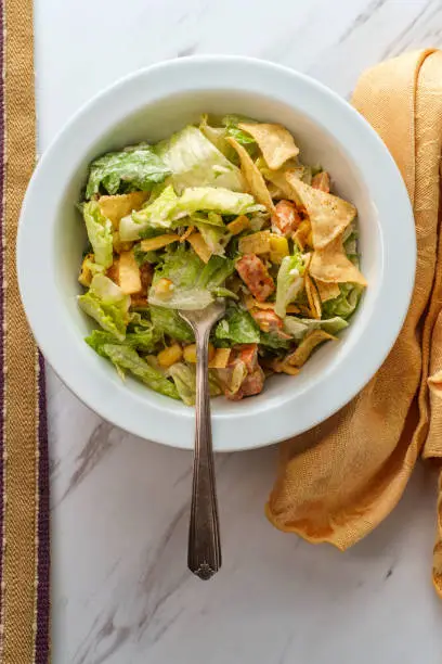 Chicken Santa Fe salad with tortilla strips and spicy chipotle ranch dressing