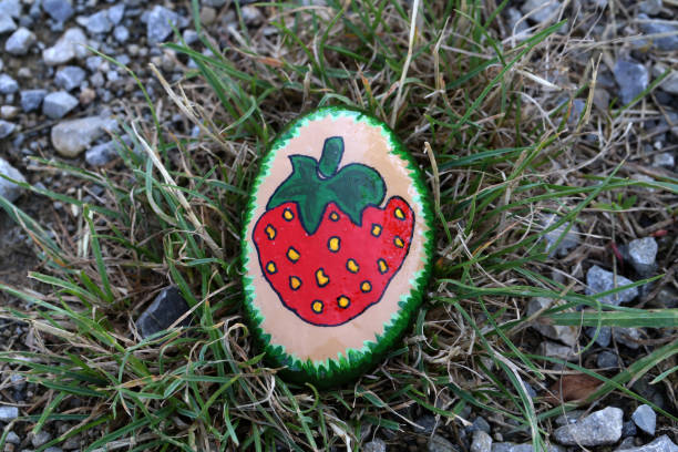 istock A painted hiking stone is left on the walking path for passersby to see 1264336895