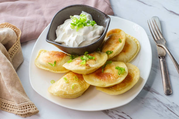 istock Polish Pierogies Sour Cream 1264336990