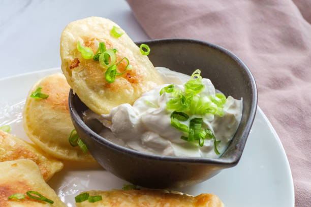 istock Polish Pierogies Sour Cream 1264337000