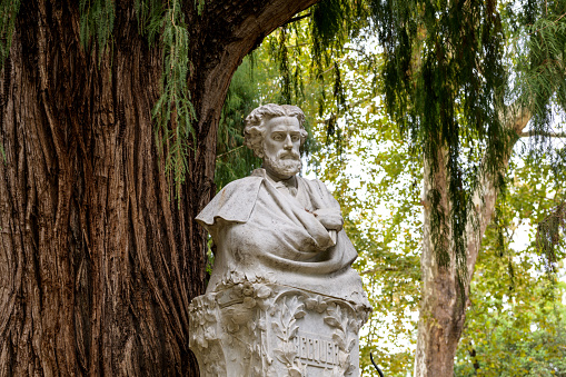 Seville, Andalusia, Spain - October 11, 2019: A close-up view of the bust of the Spanish Romanticist poet Gustavo Adolfo Dominguez Becquer (1836-1870) at Becquer Monument in Maria Luisa Park.