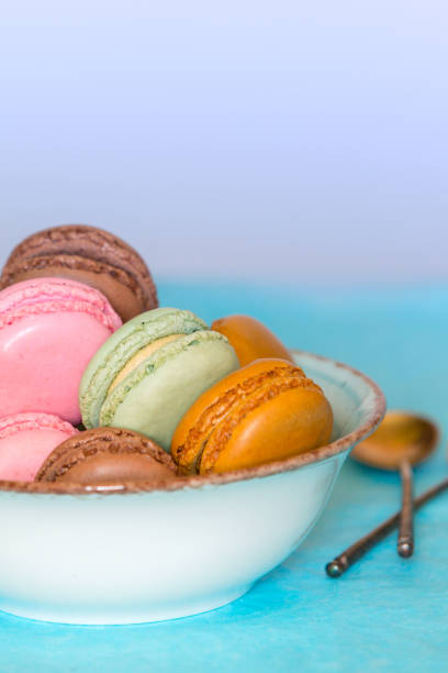 istock Colorful macaroons. Sweet macarons bowl 1264339748