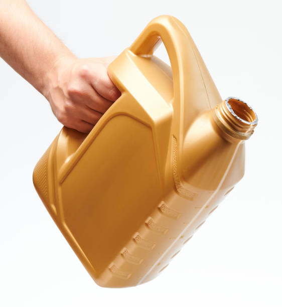 istock Hand hold open yellow jerry can 1264340395