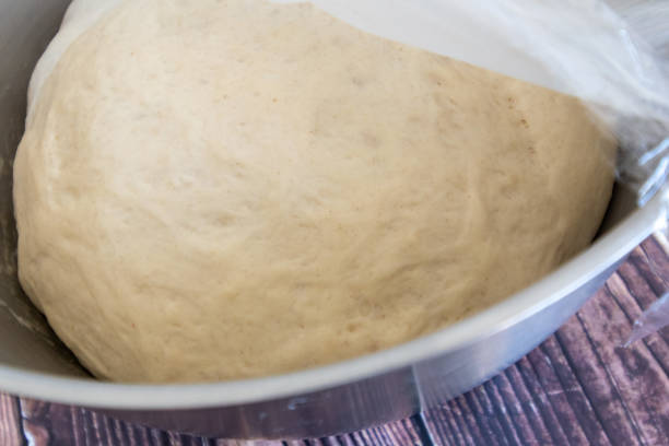 istock Bread dough rising in a bowl 1264341818
