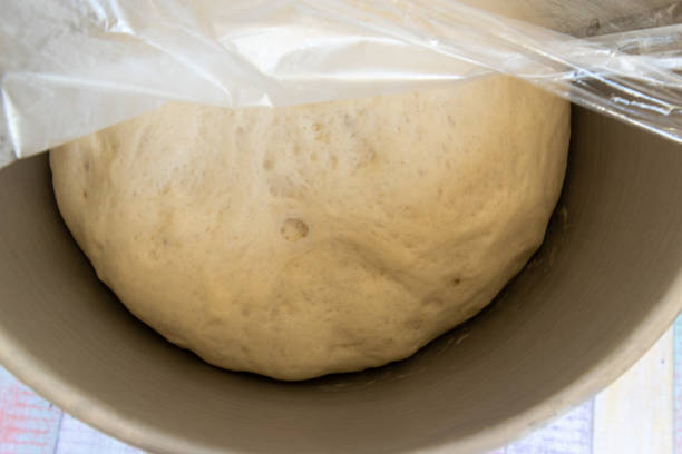 istock Bread dough rising in a bowl 1264342384