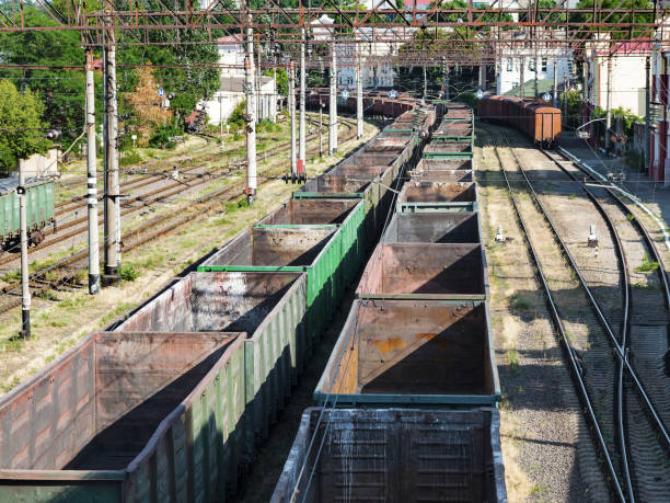 istock Odessa, Ukraine - August 17, 2010: Freight trains stand in a queue for loading at the cargo terminal of the Odessa sea port. Rail transportation most economical logistics solutions 1264342954