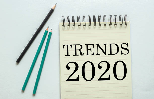 istock two green one black pencil with text Trends 2020 in the notebook on the white background 1264342992