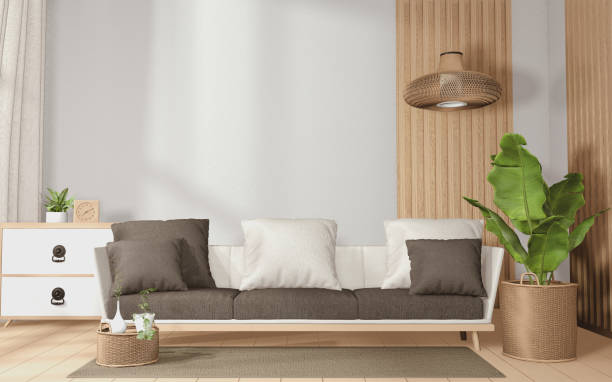 istock tropical room interior with sofa and plants decoration on wooden floor.3D rendering 1264343244