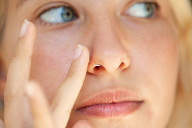 istock blue eyed girl wearing a nose piercing 1264344952