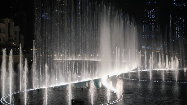 istock Dancing fountains in Dubai in the evening 1264346218