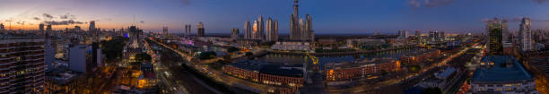 Panoramic view of Buenos Aires at sunset Aerial panoramic of Puerto Madero - Buenos Aires - Argentina puente de la mujer stock pictures, royalty-free photos & images