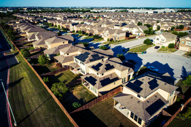 istock Suburb with Houses with Rooftop Solar 1264348772