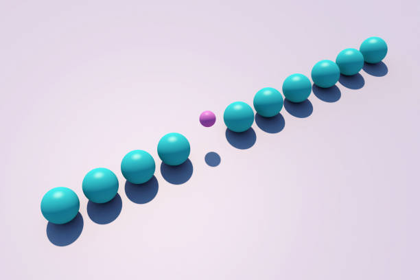 Purple ball among blue ones. Standing out from the crowd.