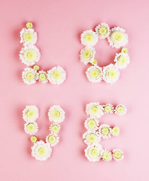 istock the word love is lined with flowers top view 1264349102