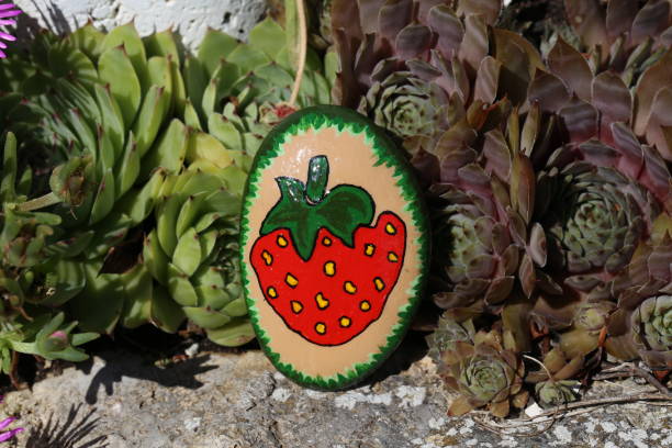 istock A painted hiking stone is left on the walking path for passersby to see 1264351794