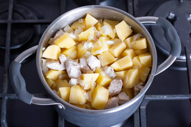 istock Potato with meat in a pot 1264358232