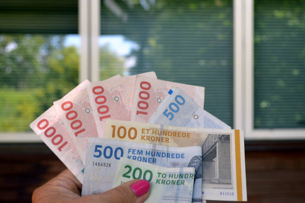 istock Danish currency against a residential building 1264361245