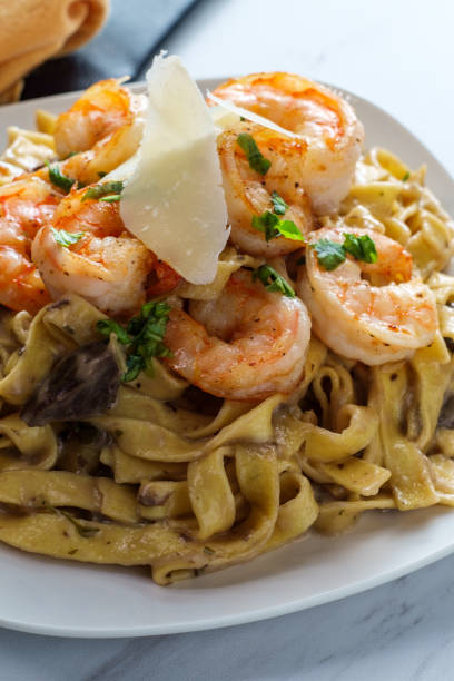 istock Fettuccine Alfredo Shrimp Mushrooms 1264361698