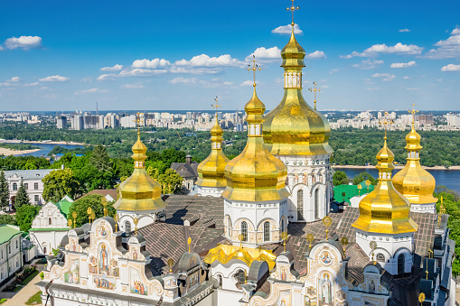 Stock photograph of the Dormition Cathedral at the landmark Kiev Pechersk Lavra monastery in Kiev Ukraine on a sunny day, a UNESCO World Heritage Site.