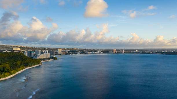 Tumon Bay Panoramic A wide view of Tumon Bay during the day in Guam. guam stock pictures, royalty-free photos & images