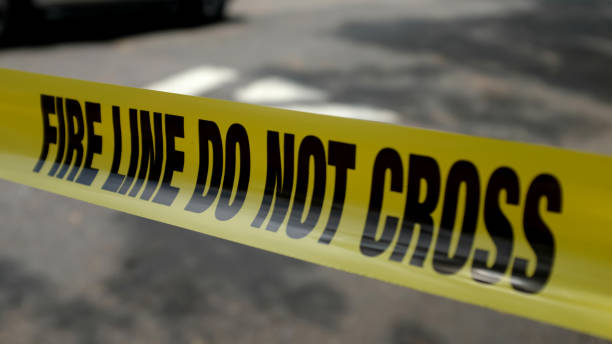 istock Yellow Caution Tape at the Scene of an Emergency 1264366780