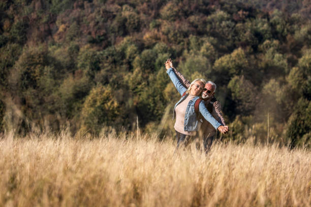 istock Senior couple hiking together. 1264368772