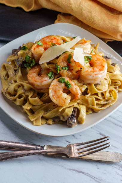 istock Fettuccine Alfredo Shrimp Mushrooms 1264372776