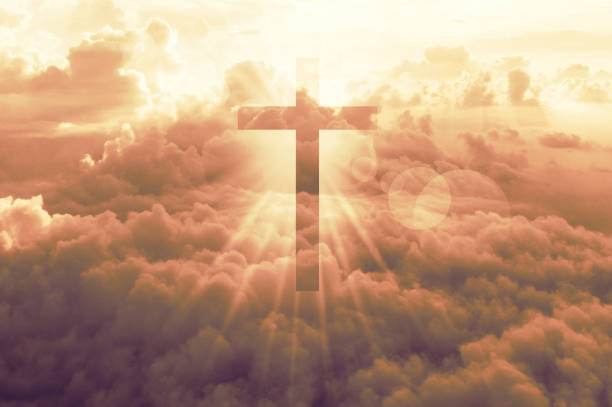 istock Christian cross appears bright in late sunset 1264372921
