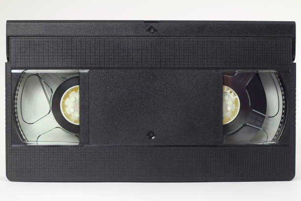 istock Black VHS video tape cassette with blank label isolated on white background 1264374195