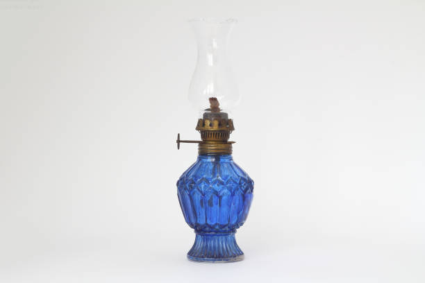 Vintage blue oil lamp isolated on white background