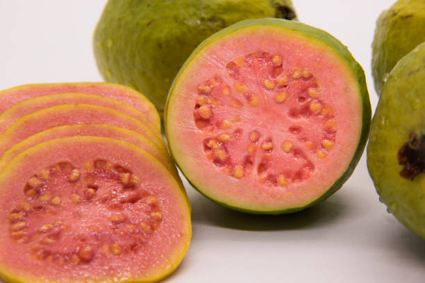 istock Some Brazilian guavas on white background. Tropical fruit. 1264374380