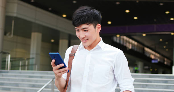 istock businessman use smart phone 1264394719
