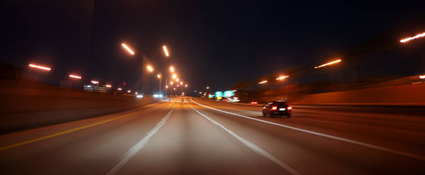 istock Driving at night long exposure Miami 1264397520