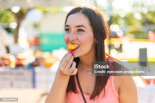 One Female Enjoying A Farmers Market Stock Photo - Download Image Now - Supermarket, Tasting, Agricultural Fair