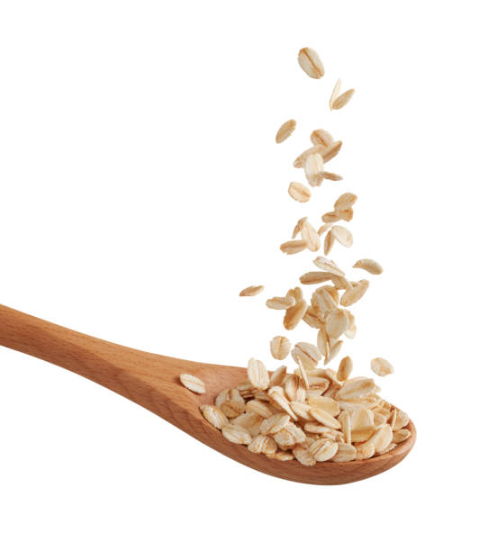 istock scoop of oatmeal splashing 1264399926