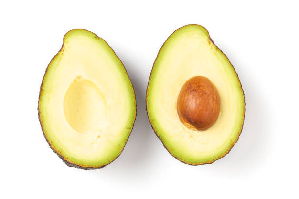 istock Two slices of avocado isolated on white background 1264402984