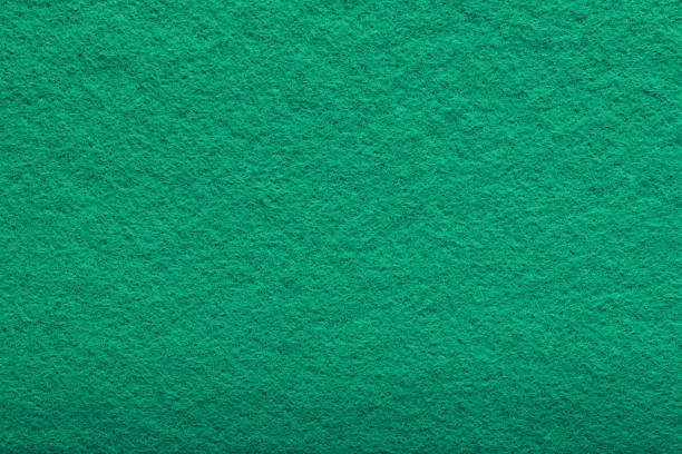 shaggy surface. fine grain felt green fabric. artificial grass. fleecy texture background. - cotton smooth green plant imagens e fotografias de stock